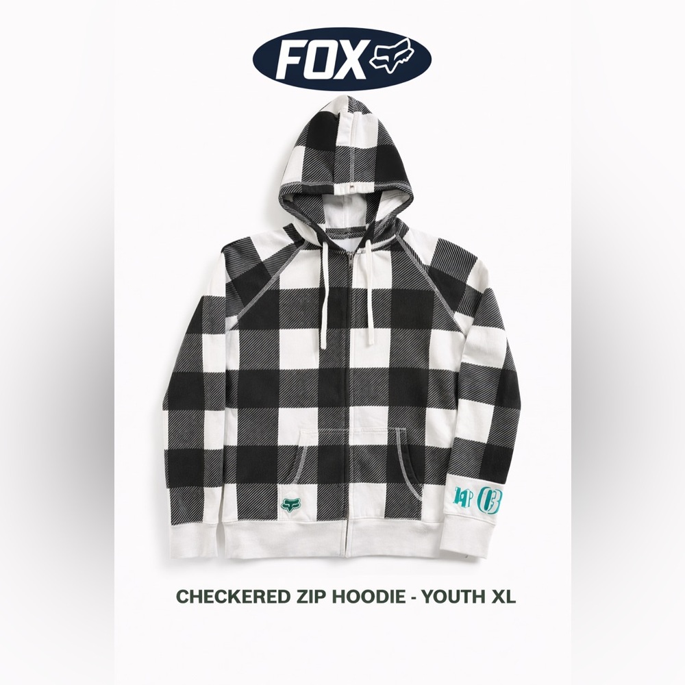 Fox Black and White Garment with Teal Trim